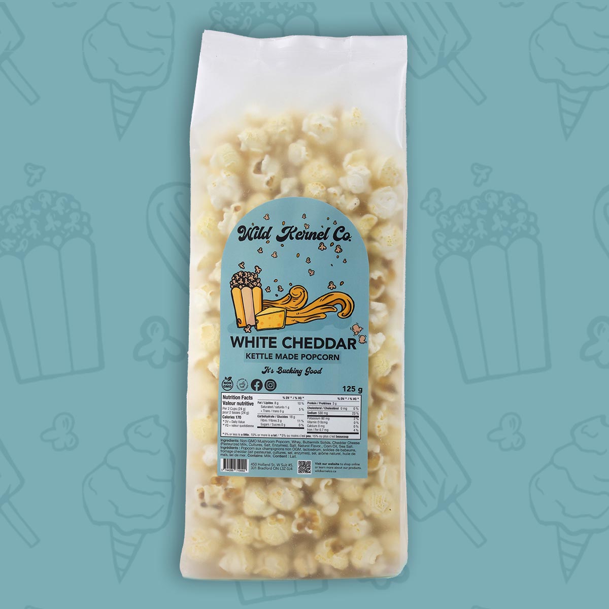 Close-up of Wild Kernel Co.’s White Cheddar Popcorn, showing the rich white cheddar seasoning on non-GMO Mushroom Kernels.